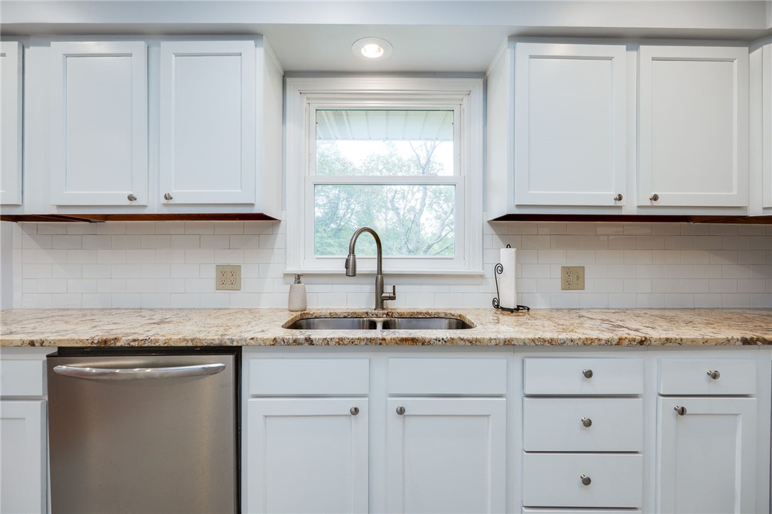 6950 Red Lion 5 Points Road Springboro, OH 45066 - Photo 22 of 78 This bright kitchen features sleek appliances and generous counter space for culinary endeavors.