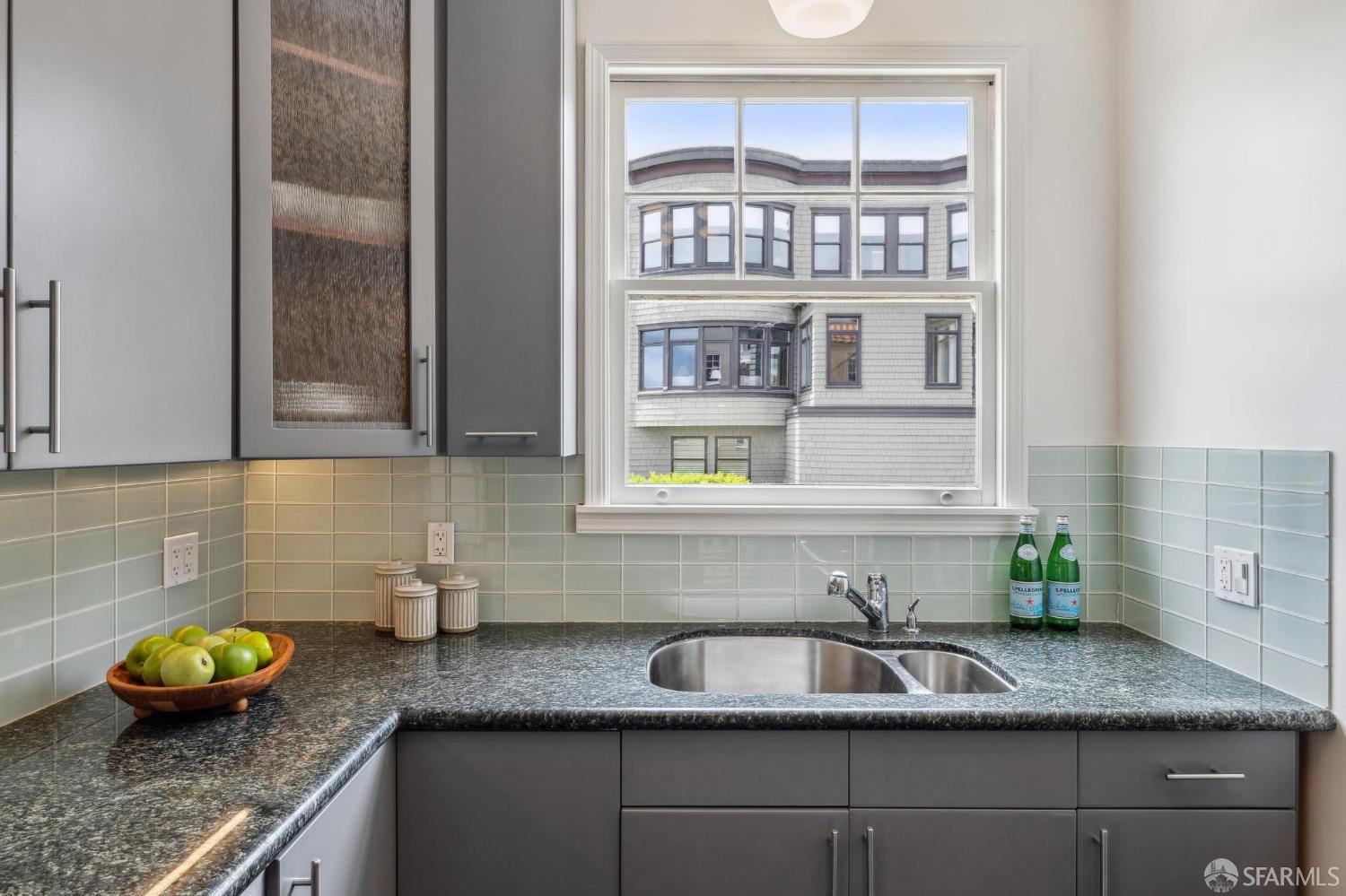 54 Upper Terrace San Francisco, CA 94117 - Photo 19 of 61 a kitchen with a sink and a window