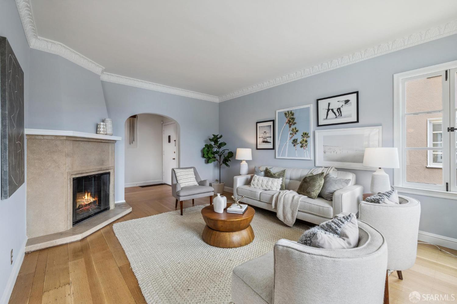 54 Upper Terrace San Francisco, CA 94117 - Photo 2 of 61 a living room with furniture and a fireplace