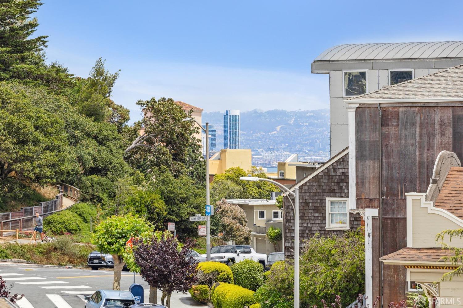 54 Upper Terrace San Francisco, CA 94117 - Photo 39 of 61 a aerial view of a house with a yard and balcony