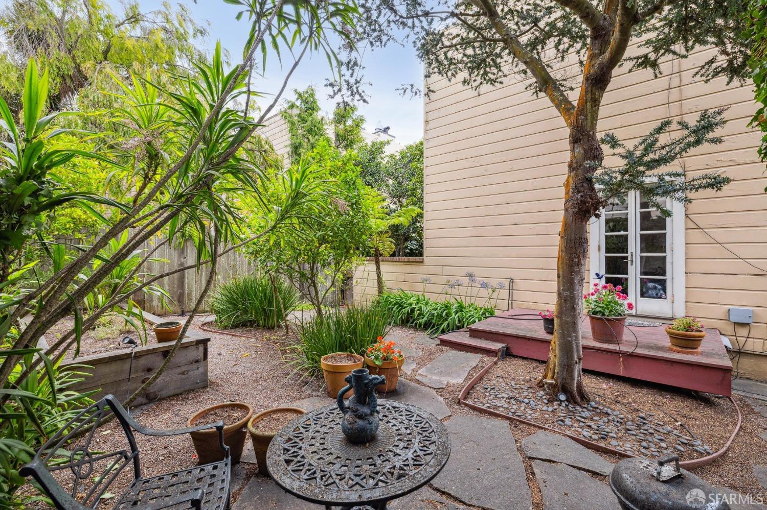 54 Upper Terrace San Francisco, CA 94117 - Photo 45 of 61 a backyard of a house with outdoor seating