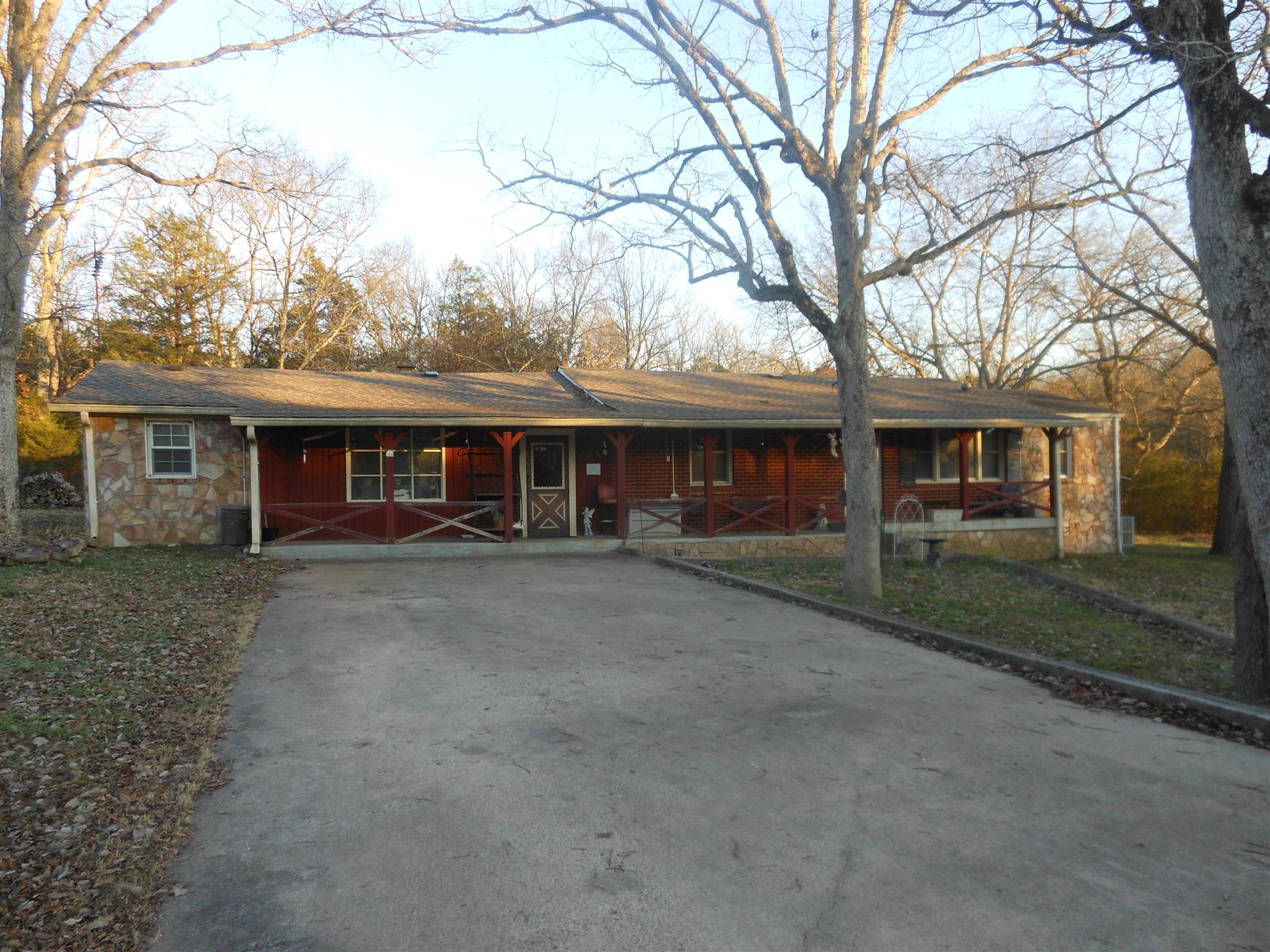 1490 Fall Creek Road Lebanon, TN 37090 - Photo 11 of 27 front view of a house with a yard