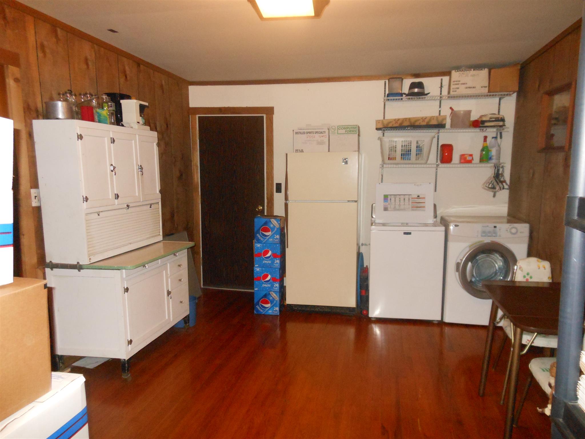 1490 Fall Creek Road Lebanon, TN 37090 - Photo 20 of 27 a view of a kitchen with refrigerator and workspace