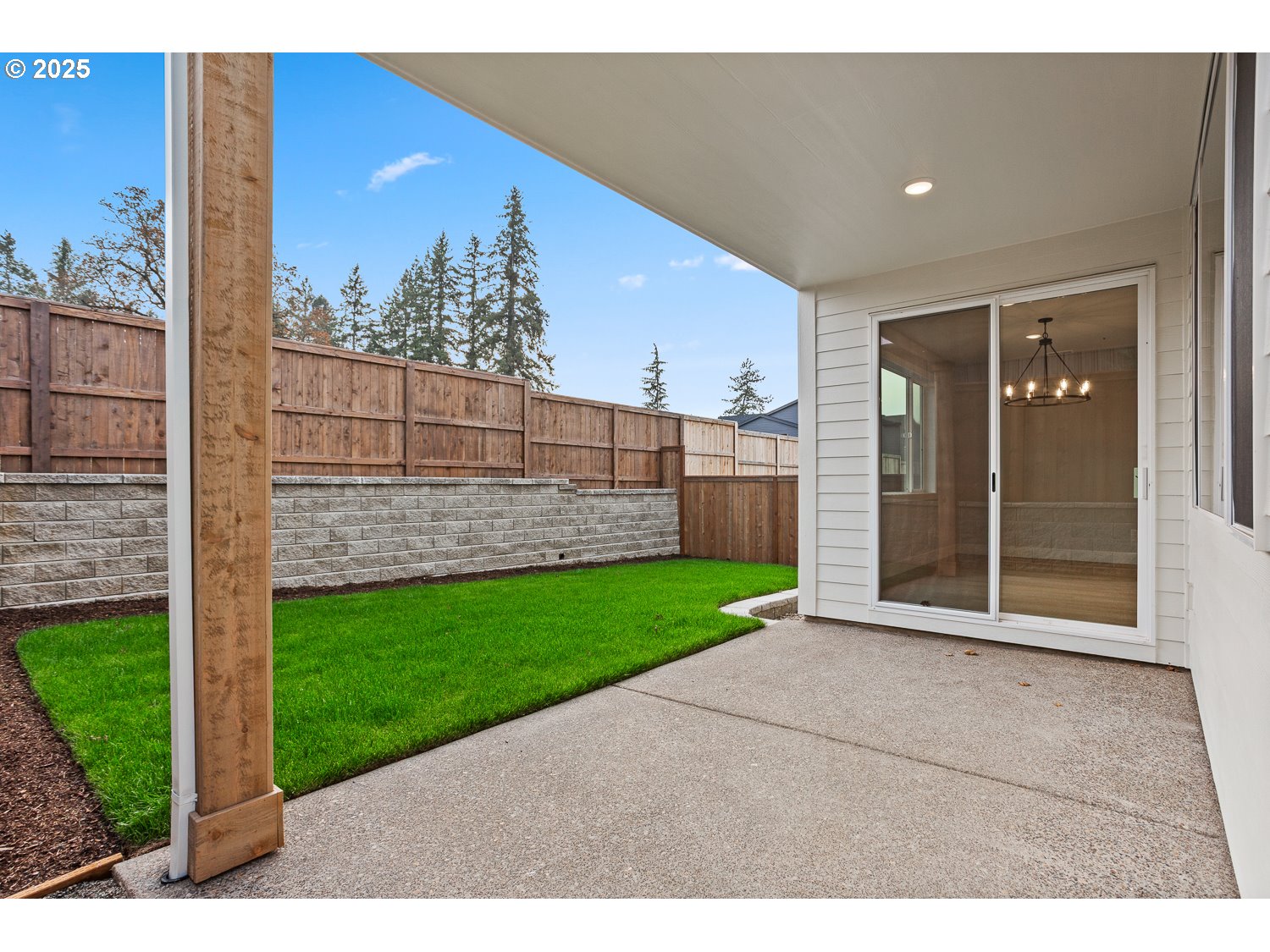7212 Southwest Windflower Street Wilsonville, OR 97070 - Photo 24 of 28 a view of a backyard with wooden fence