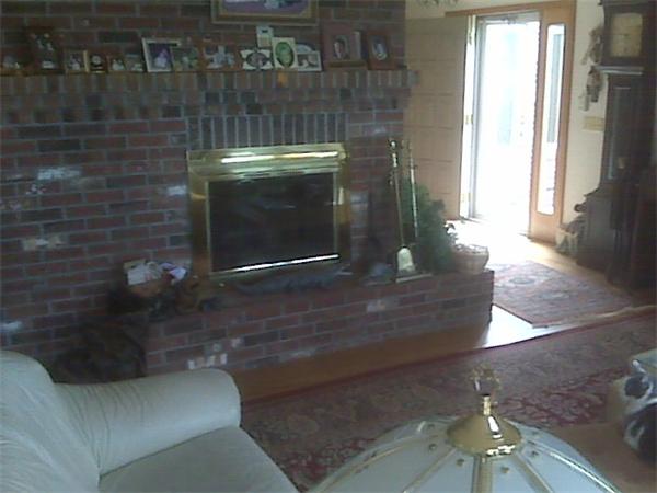 285 Petersham Road Athol, MA 01331 - Photo 16 of 21 a living room with a fireplace