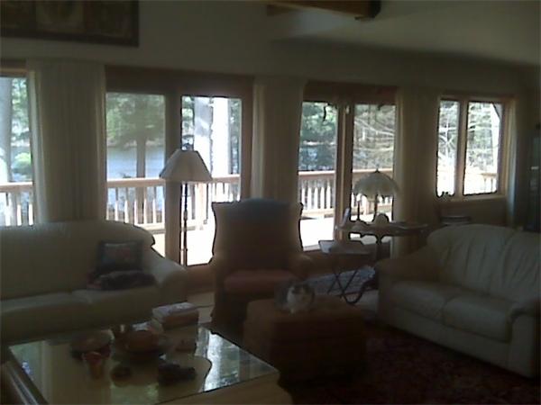 285 Petersham Road Athol, MA 01331 - Photo 20 of 21 a living room with furniture and a chandelier