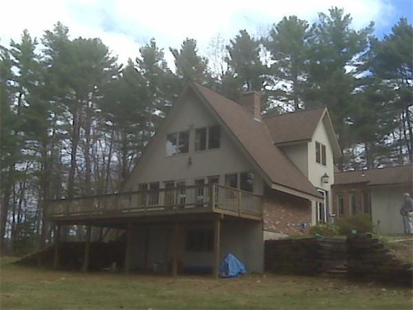 285 Petersham Road Athol, MA 01331 - Photo 2 of 21 a front view of a house with a yard