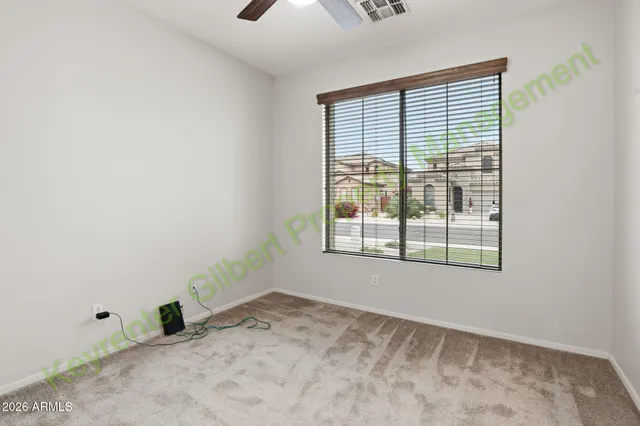 a kitchen with kitchen island sink stove and refrigerator