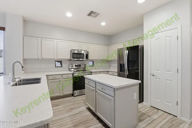 a view of livingroom with hardwood floor and ceiling fan