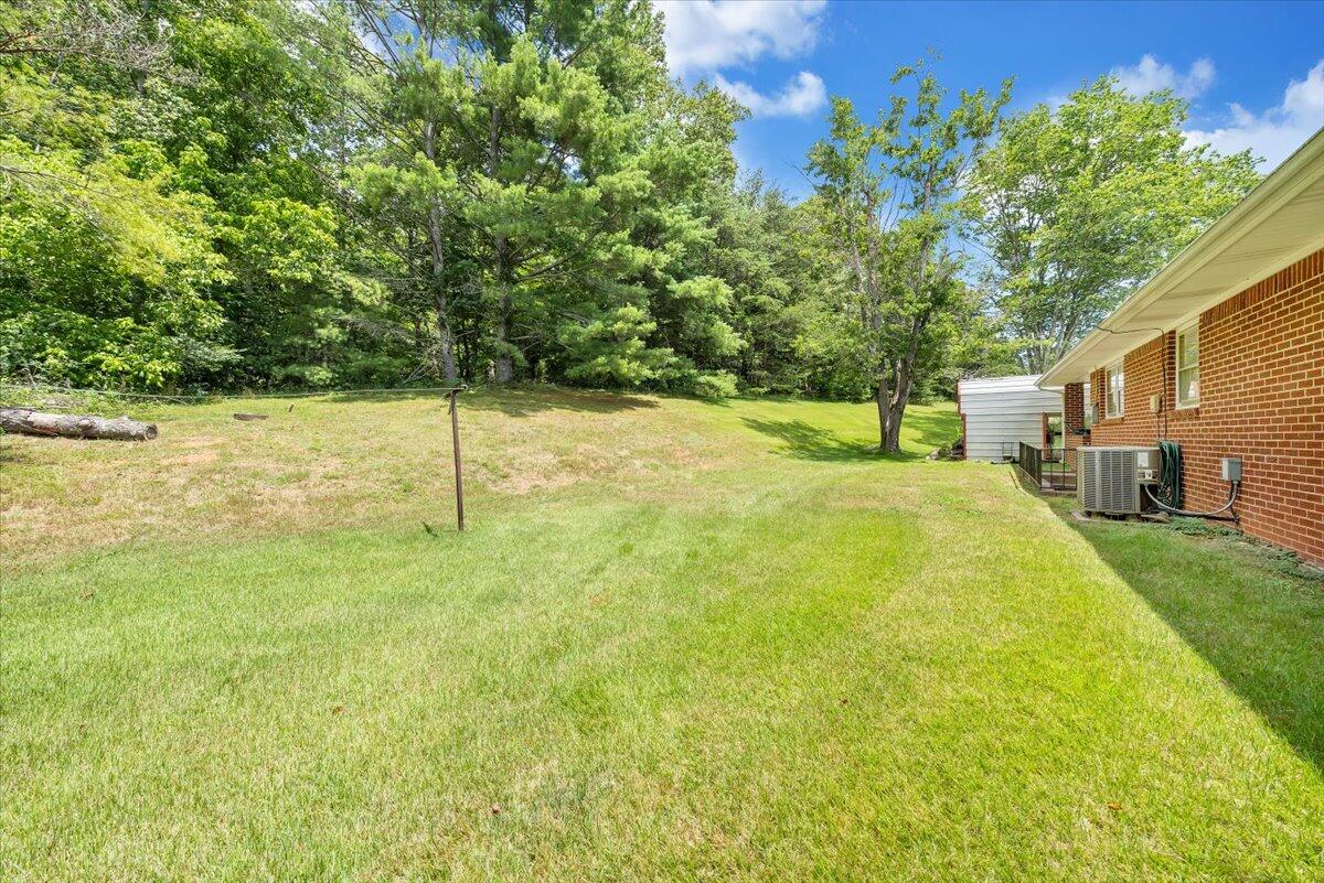 6475 Dry Hill Road Ferrum, VA 24088 - Photo 29 of 51 a swimming pool with an outdoor space and seating area
