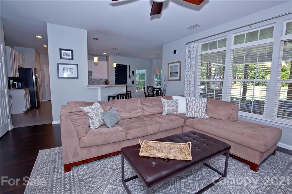 20200 Tailwind Lane Cornelius, NC 28031 - Photo 4 of 28 a living room with furniture and a large window