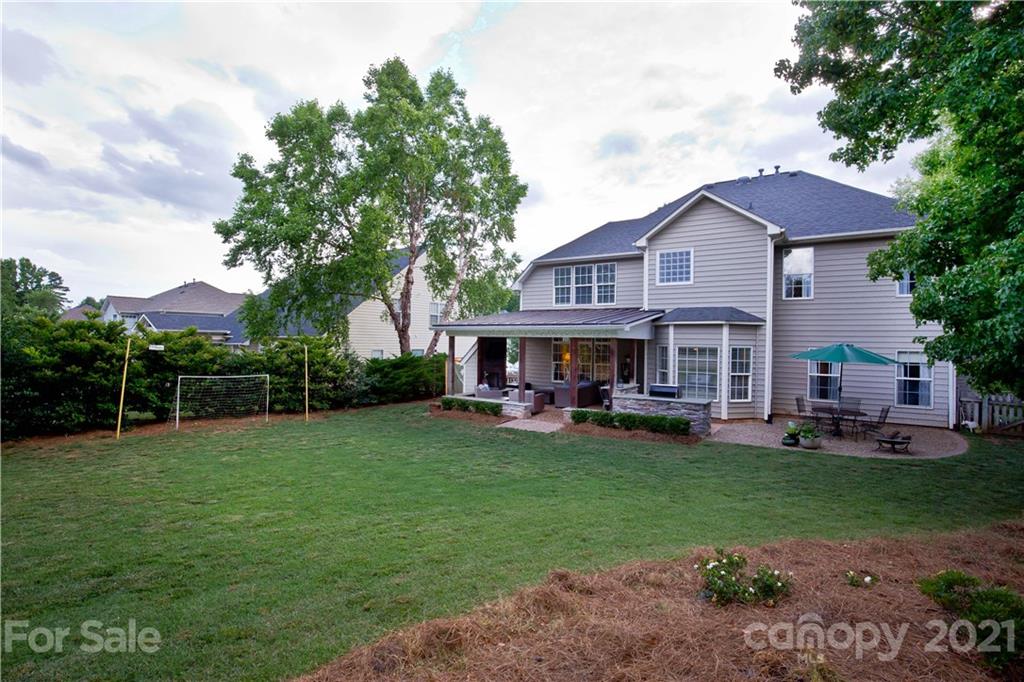 20200 Tailwind Lane Cornelius, NC 28031 - Photo 10 of 28 a view of a house with a yard porch and sitting area