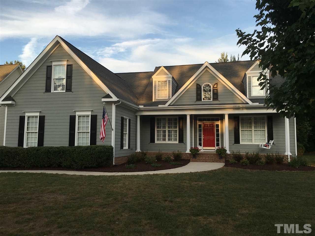 1618 Weatherford Circle Raleigh, NC 27604 - Photo 1 of 20 a front view of a house with garden