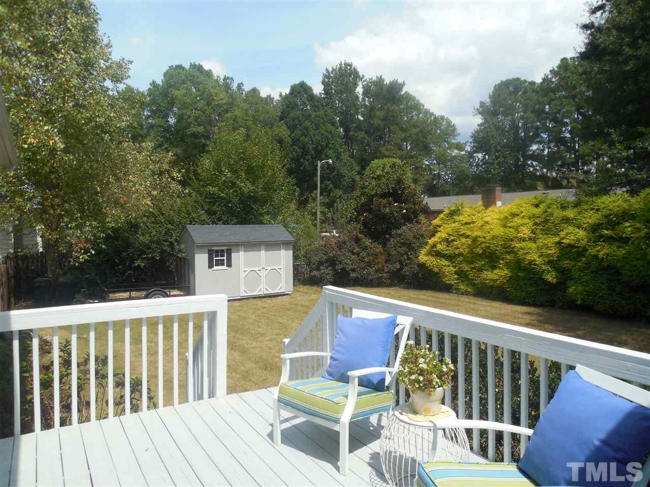1618 Weatherford Circle Raleigh, NC 27604 - Photo 17 of 20 a view of a chair and table on the deck