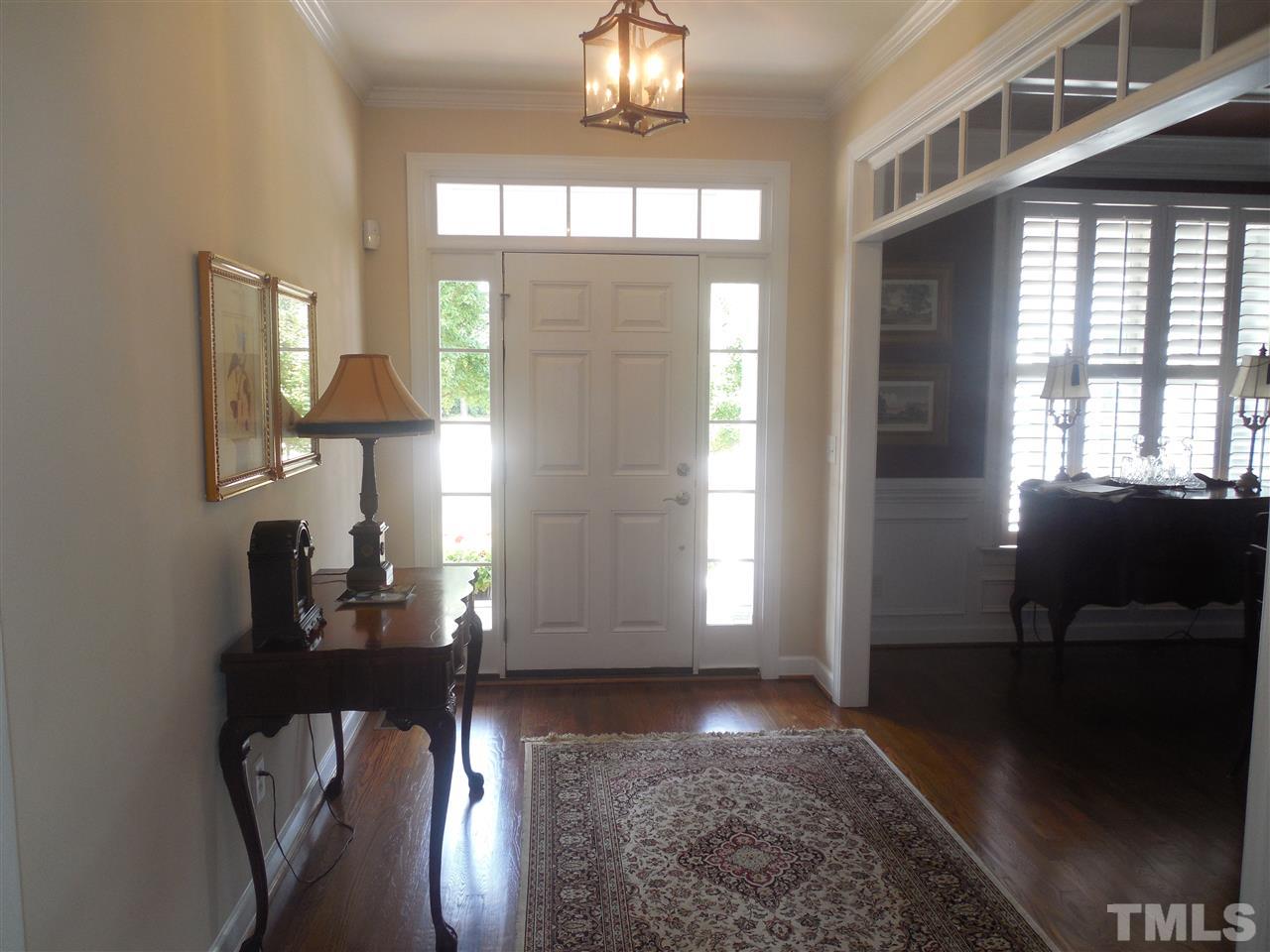 1618 Weatherford Circle Raleigh, NC 27604 - Photo 3 of 20 a view of entryway and hall with wooden floor
