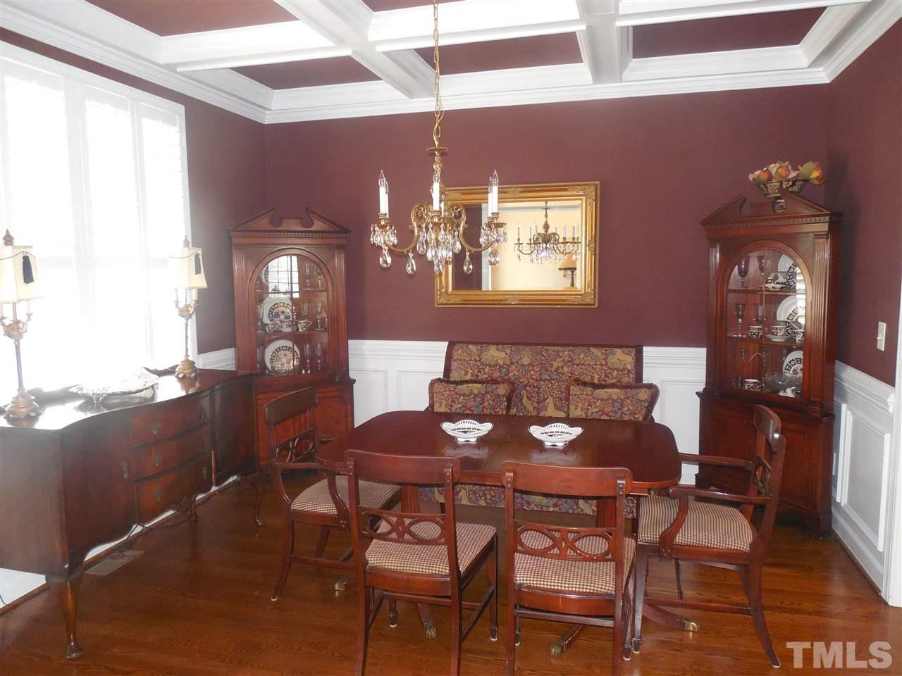 1618 Weatherford Circle Raleigh, NC 27604 - Photo 4 of 20 a view of a dining room with furniture and chandelier