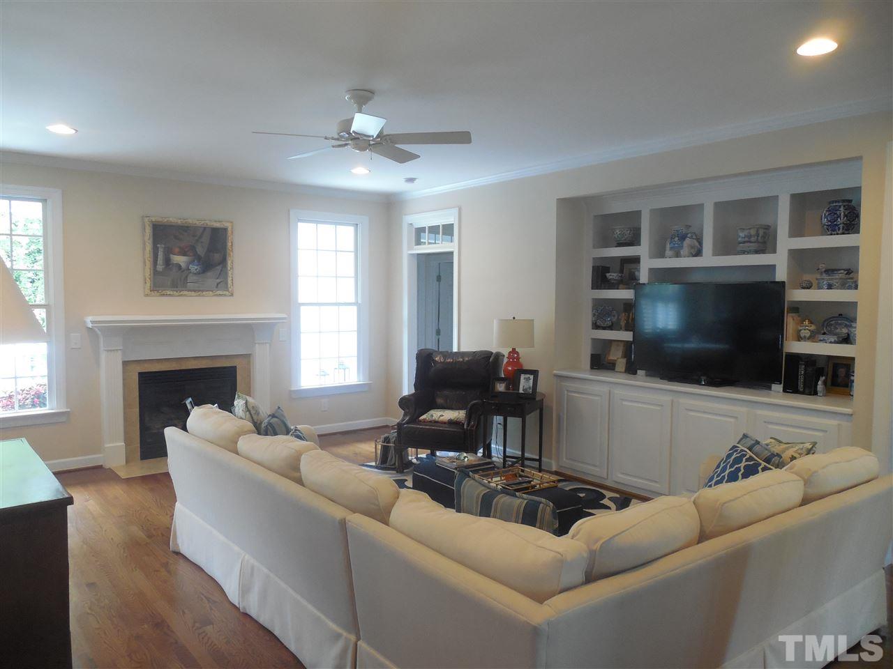 1618 Weatherford Circle Raleigh, NC 27604 - Photo 5 of 20 a living room with furniture and a flat screen tv