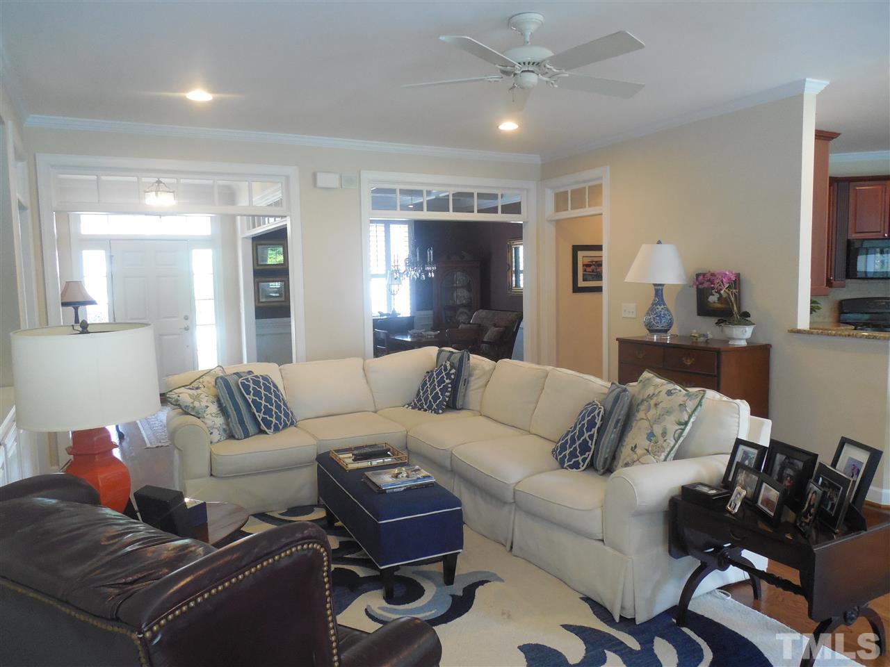 1618 Weatherford Circle Raleigh, NC 27604 - Photo 6 of 20 a living room with furniture and a large window