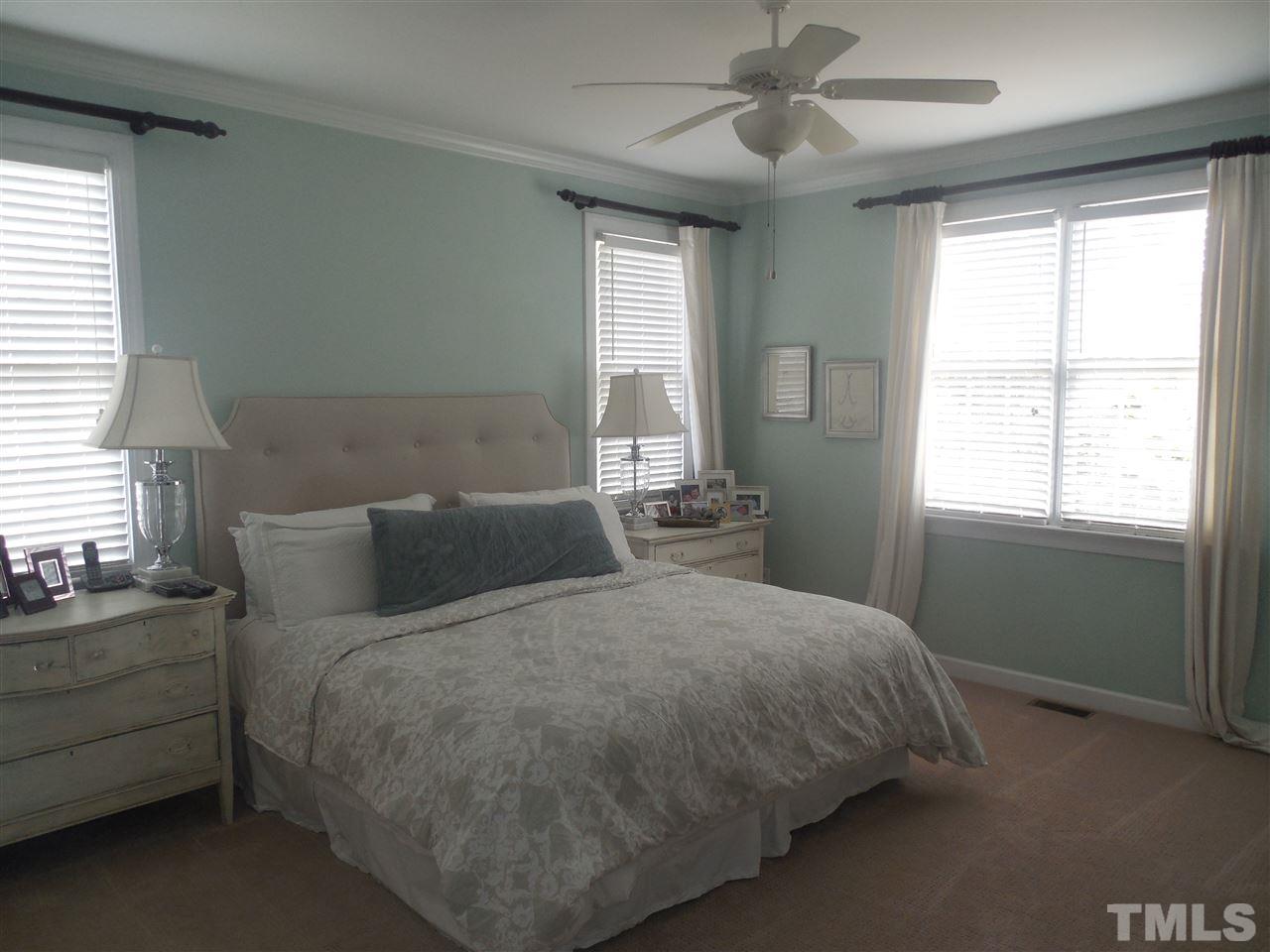 1618 Weatherford Circle Raleigh, NC 27604 - Photo 10 of 20 a bedroom with a bed and window
