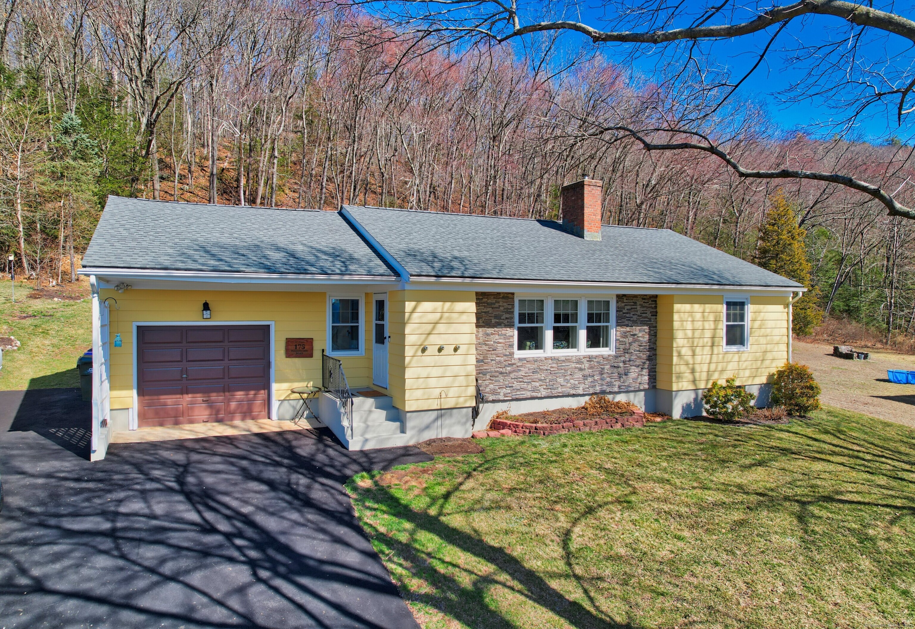175 Pleasant View Road Thomaston, CT 06787 - Photo 1 of 1 a front view of a house with garden