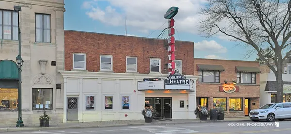 a front view of a building with street view