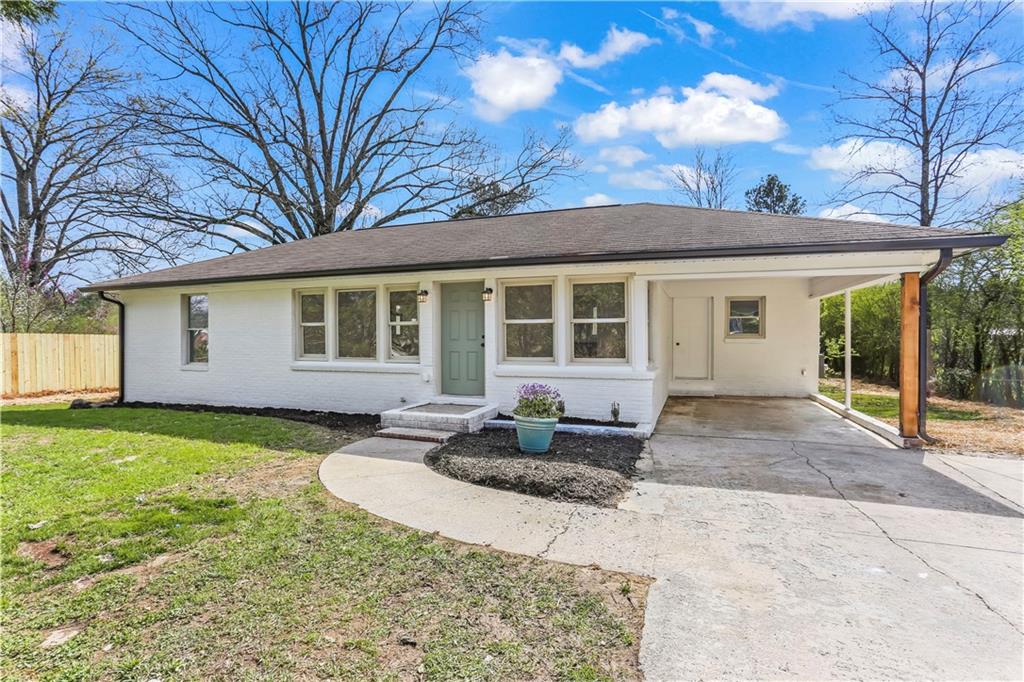 4251 Alabama Highway Rome, GA 30165 - Photo 1 of 1 a house that has a tree in front of it
