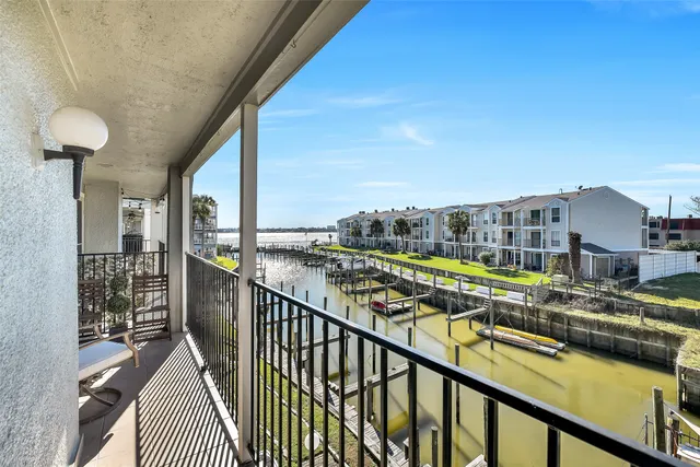 a view of balcony with furniture