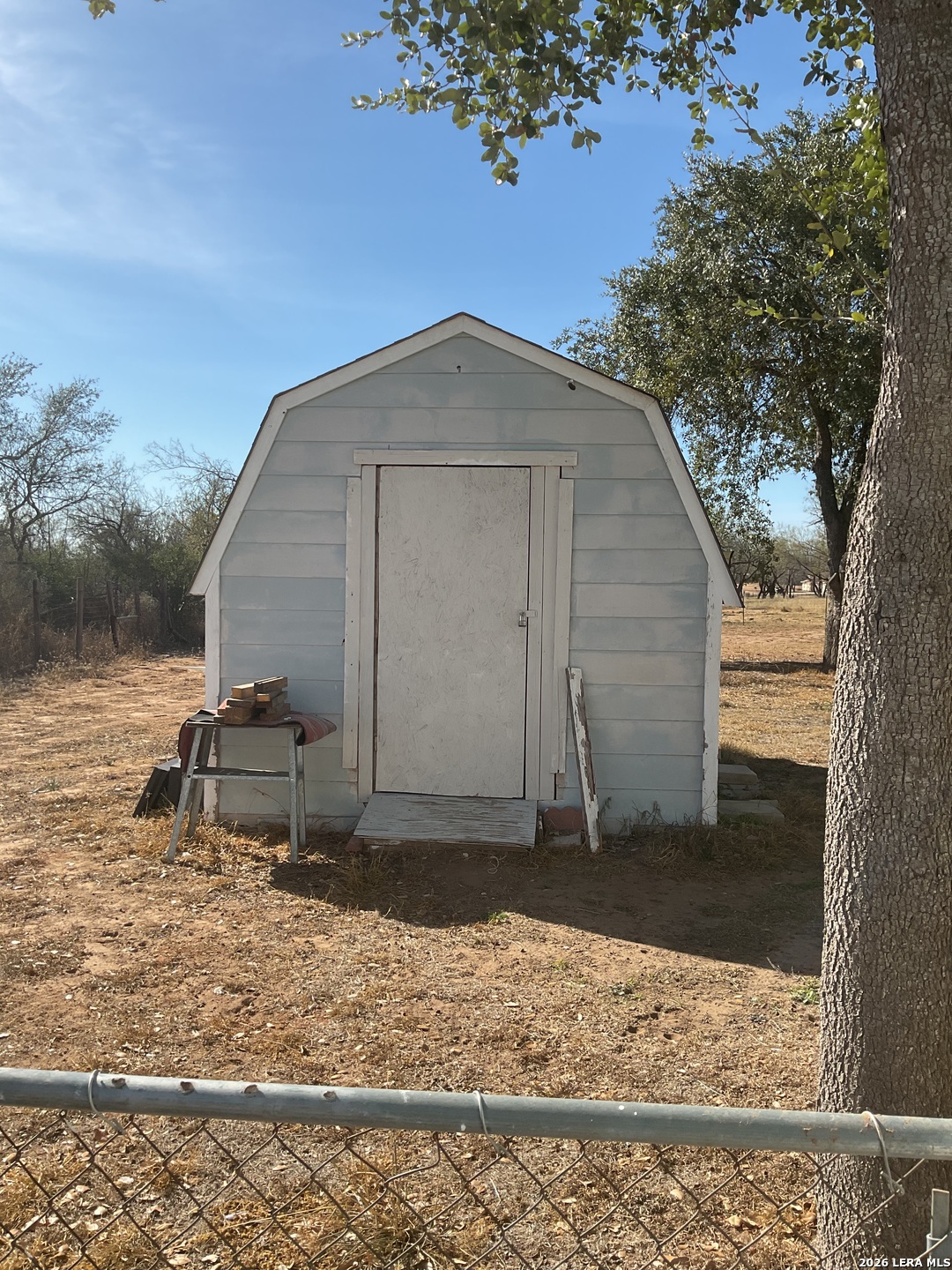 110 Renfro Drive Devine, TX 78016 - Photo 15 of 17 a front view of a house with a yard