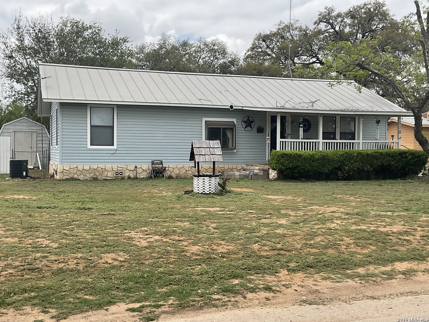 110 Renfro Drive Devine, TX 78016 - Photo 3 of 17 a front view of a house with a yard