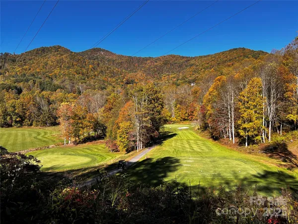 a view of a city with mountains in the background