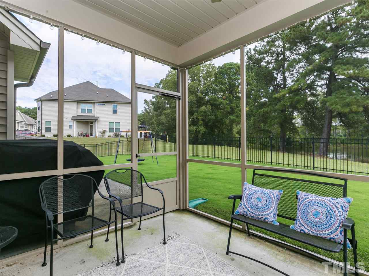 7726 Cedarshire Court Raleigh, NC 27616 - Photo 23 of 28 a garden view with a seating space