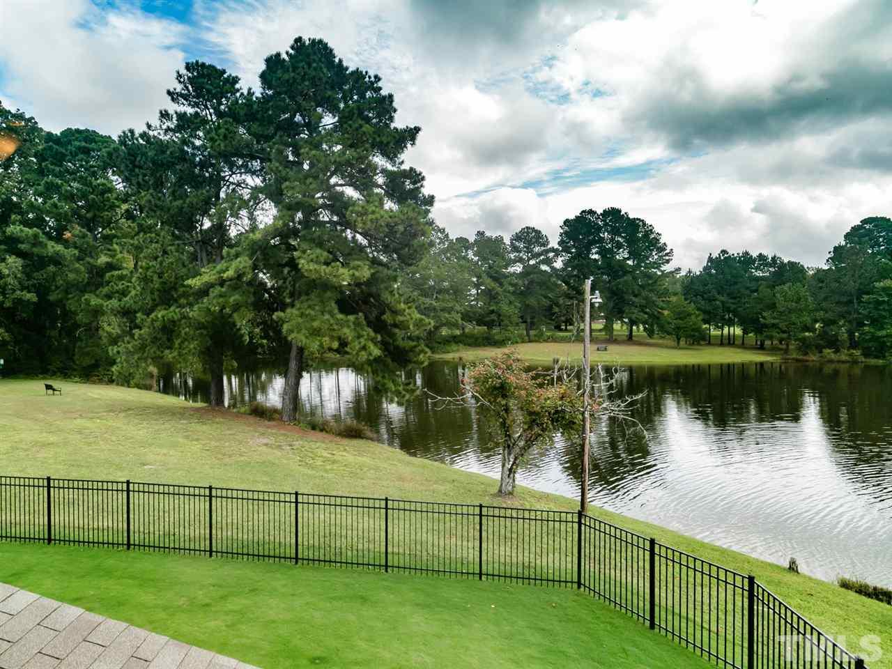 7726 Cedarshire Court Raleigh, NC 27616 - Photo 25 of 28 a view of a lake
