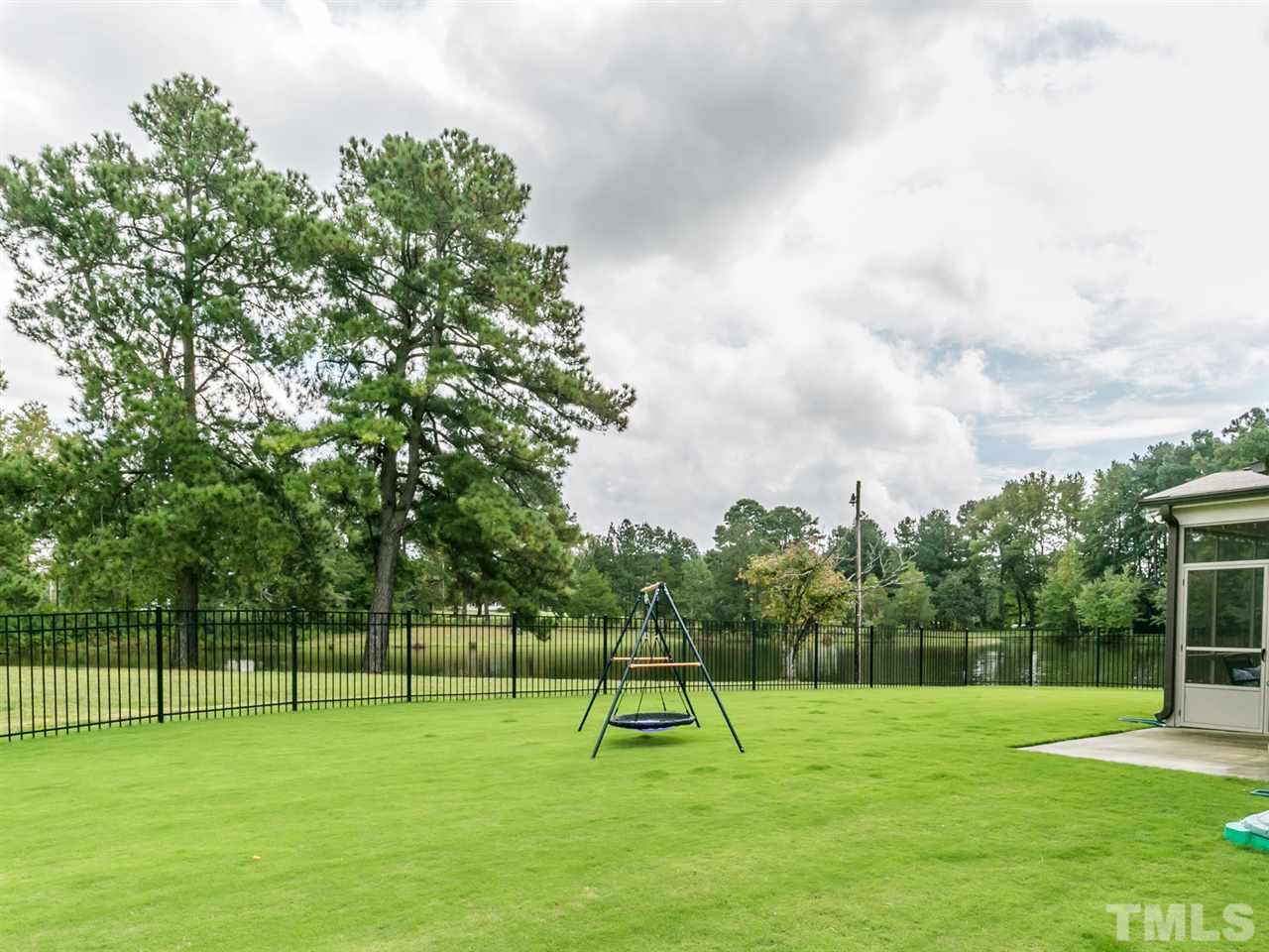7726 Cedarshire Court Raleigh, NC 27616 - Photo 26 of 28 a view of a kids park