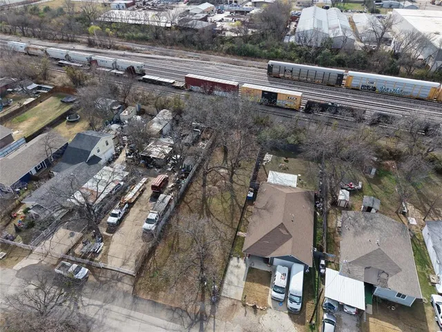 an aerial view of a city with lots of residential buildings