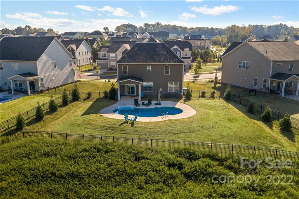 4025 Shadowbrook Road Waxhaw, NC 28173 - Photo 2 of 48 an aerial view of a house with swimming pool