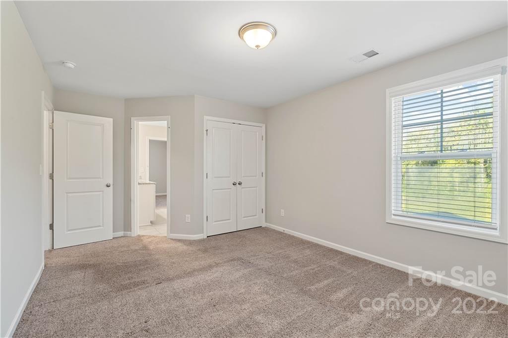 4025 Shadowbrook Road Waxhaw, NC 28173 - Photo 30 of 48 a view of an empty room with a window