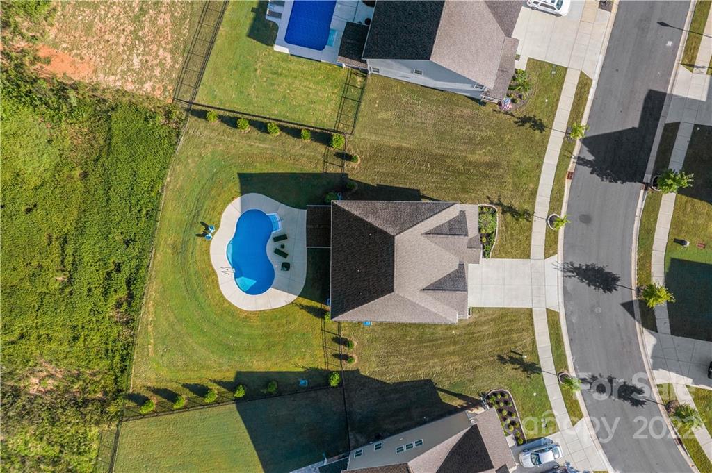 4025 Shadowbrook Road Waxhaw, NC 28173 - Photo 3 of 48 an aerial view of a house with a swimming pool