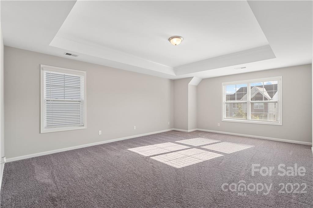4025 Shadowbrook Road Waxhaw, NC 28173 - Photo 32 of 48 an empty room with windows