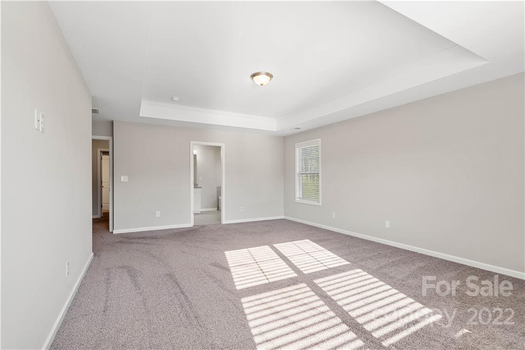 4025 Shadowbrook Road Waxhaw, NC 28173 - Photo 33 of 48 a view of an empty room and a window
