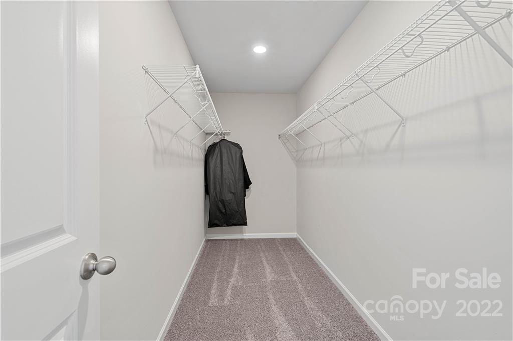 4025 Shadowbrook Road Waxhaw, NC 28173 - Photo 36 of 48 a view of a room with rack on the wall