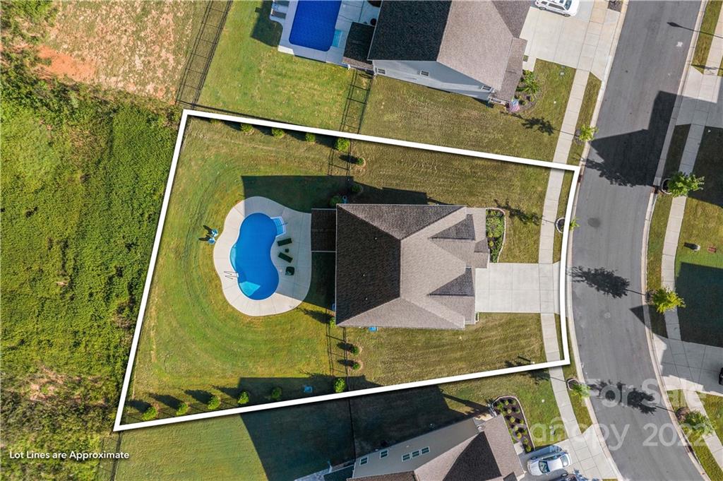 4025 Shadowbrook Road Waxhaw, NC 28173 - Photo 43 of 48 a view of swimming pool with seating area