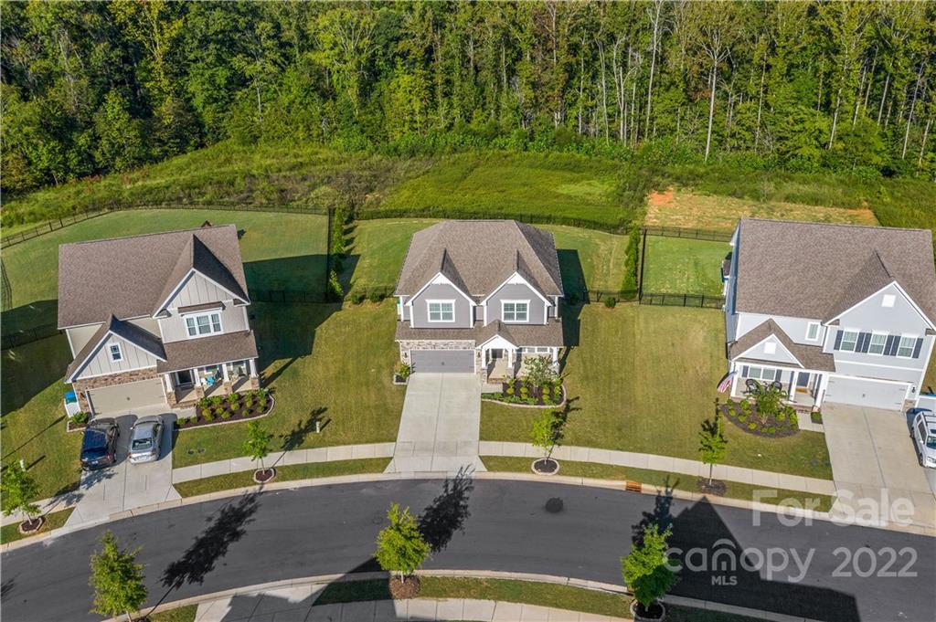 4025 Shadowbrook Road Waxhaw, NC 28173 - Photo 44 of 48 an aerial view of a house with a garden and a yard