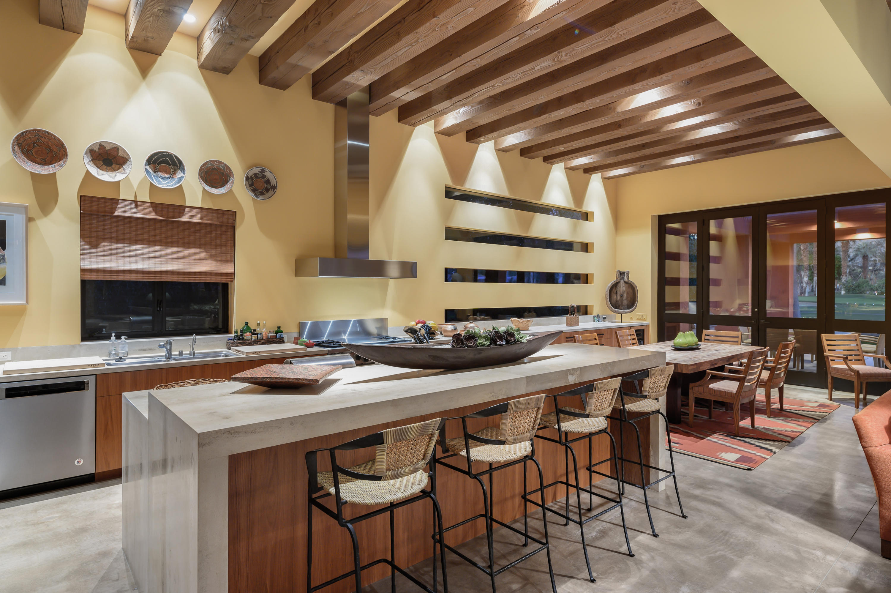 37801 Thompson Road Rancho Mirage, CA 92270 - Photo 11 of 31 a kitchen with a table and chairs in it