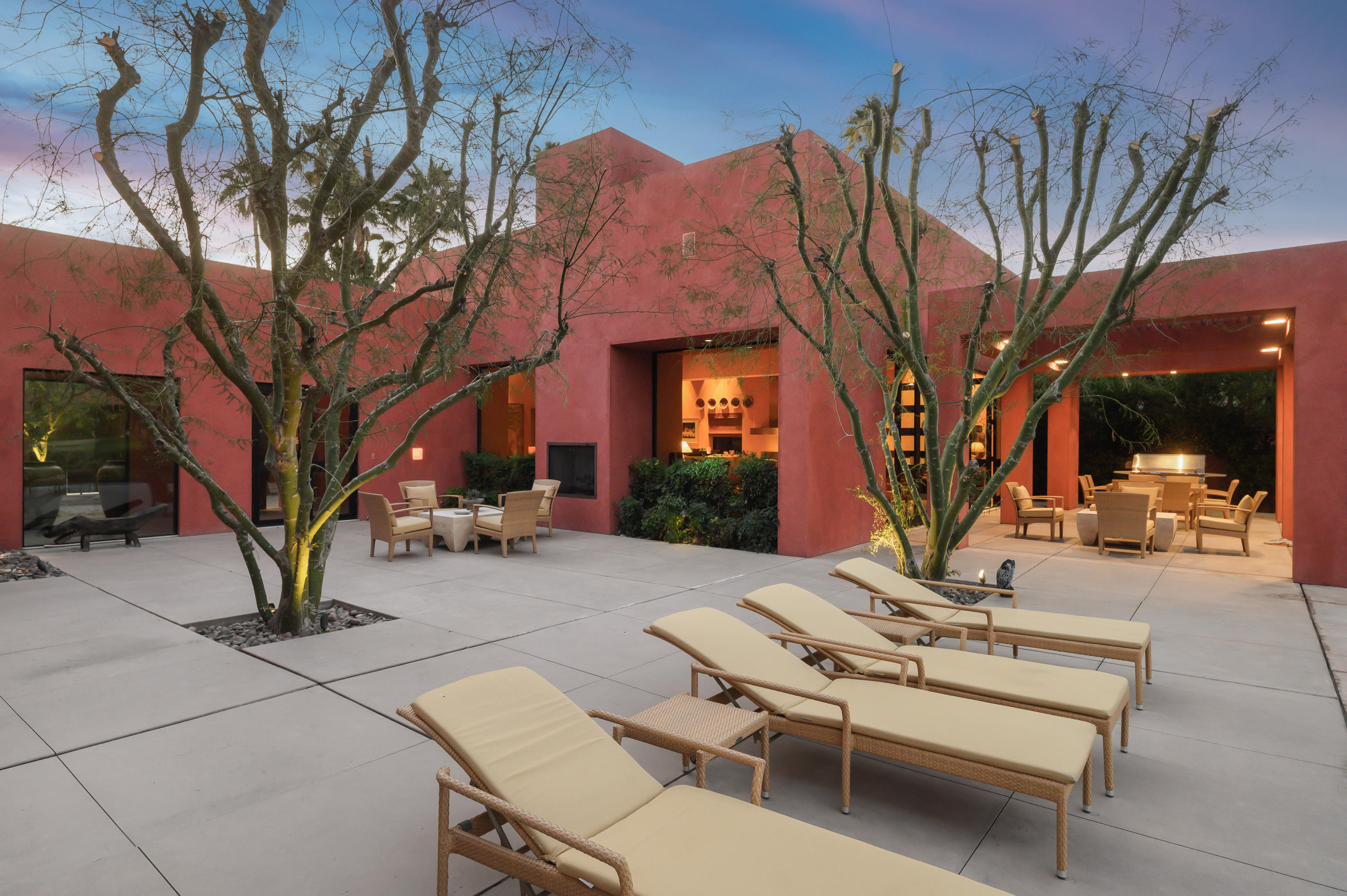 37801 Thompson Road Rancho Mirage, CA 92270 - Photo 17 of 31 a view of a patio with a table and chairs and potted plants