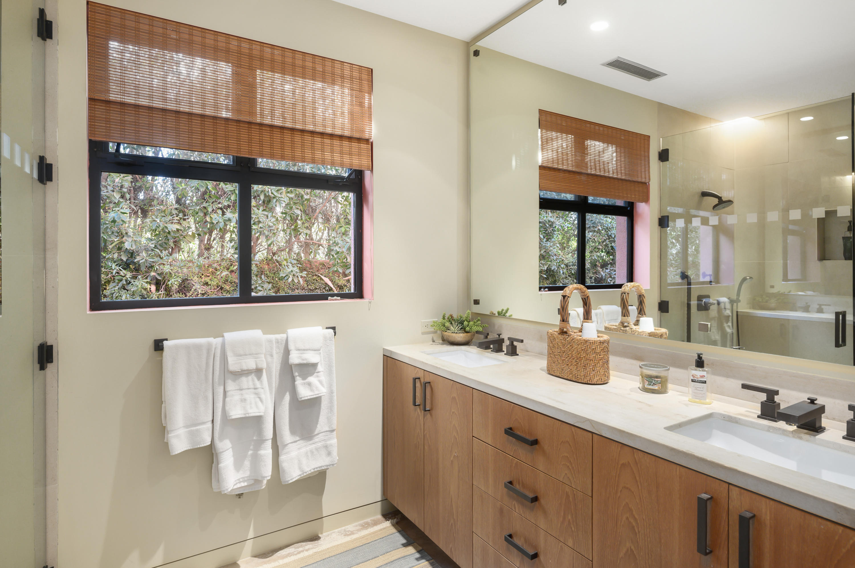 37801 Thompson Road Rancho Mirage, CA 92270 - Photo 28 of 31 a bathroom with double vanity and a two mirror