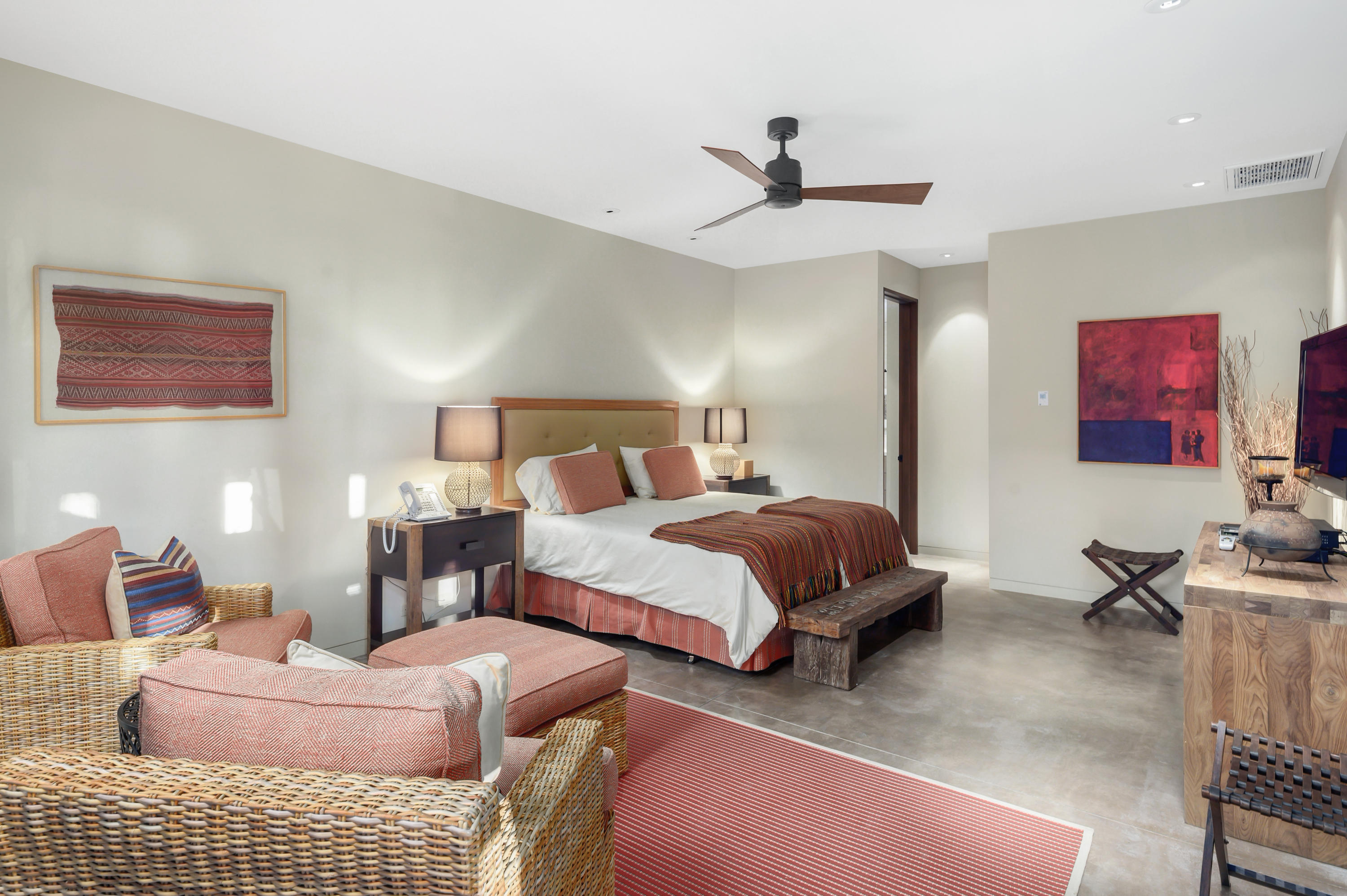 37801 Thompson Road Rancho Mirage, CA 92270 - Photo 29 of 31 a bedroom with a bed a couch and dresser