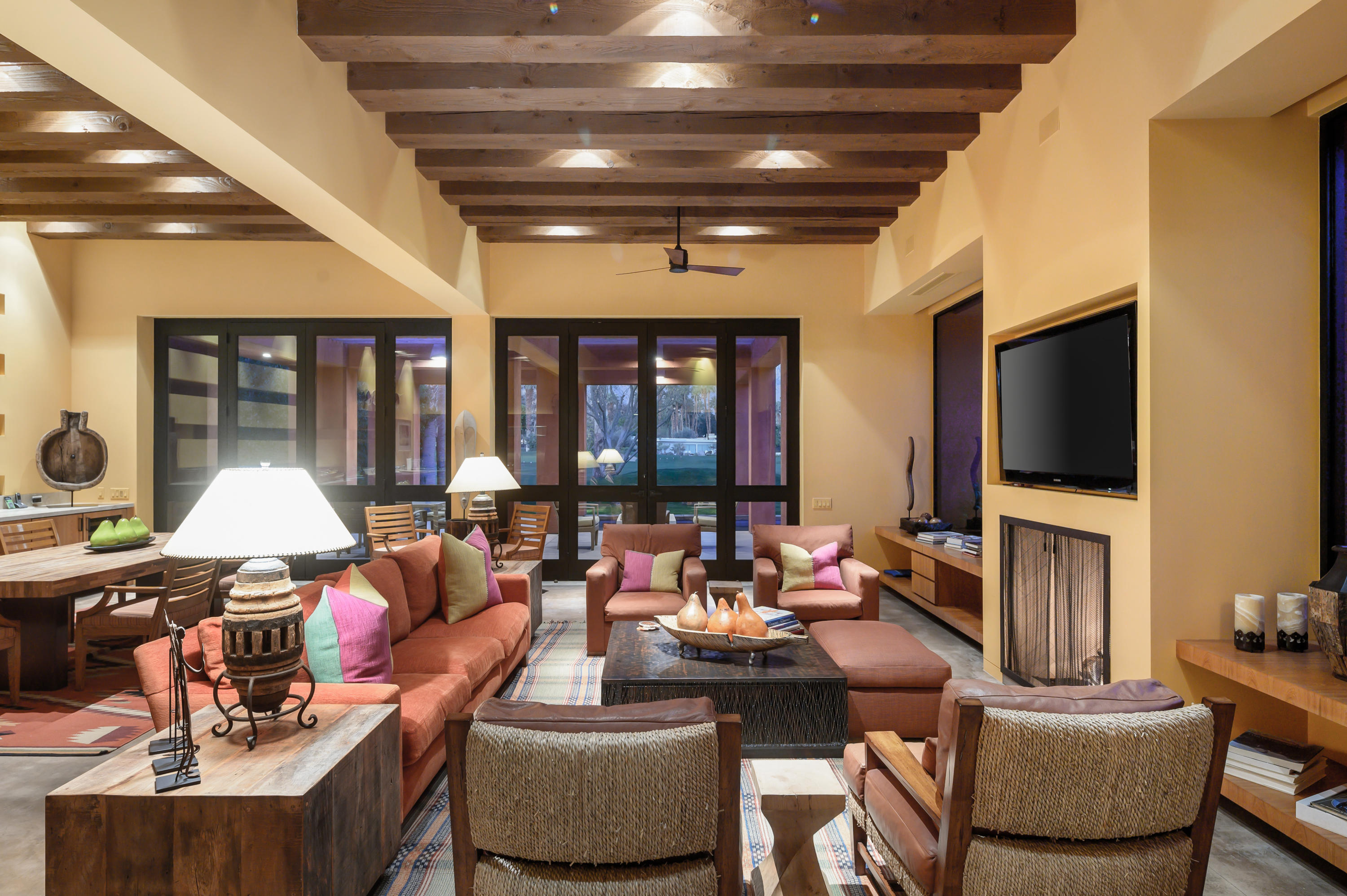 37801 Thompson Road Rancho Mirage, CA 92270 - Photo 10 of 31 a living room with furniture and a flat screen tv