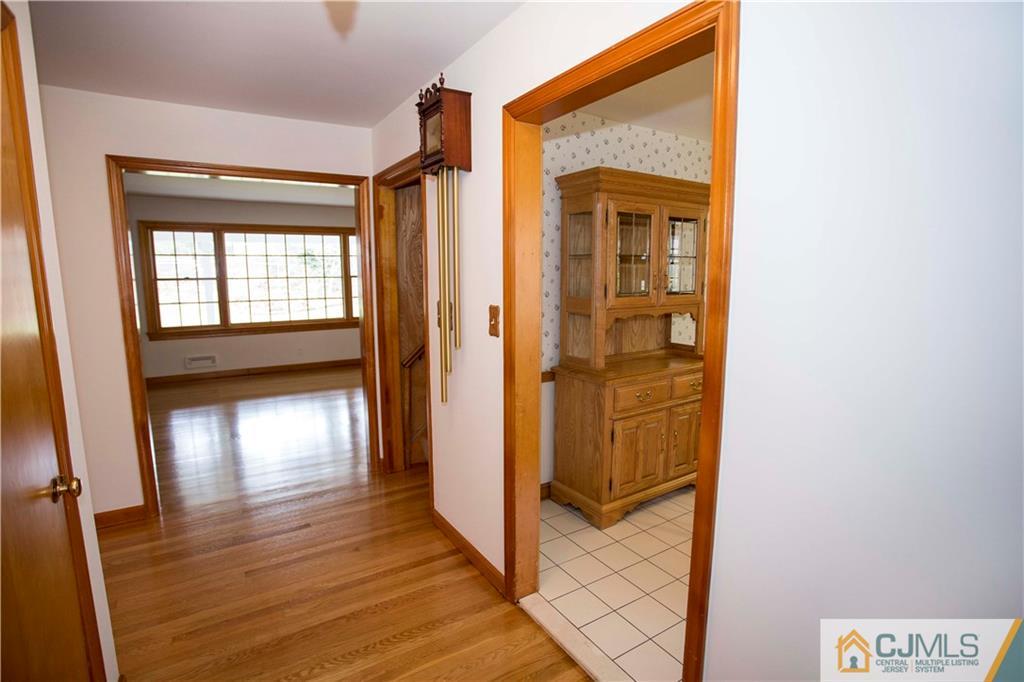 103 Buchanan Road Edison, NJ 08820 - Photo 12 of 25 a view of gallery with wooden floor