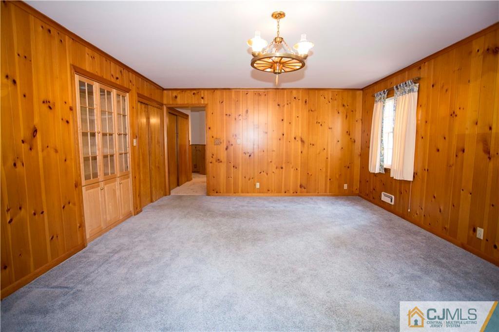 103 Buchanan Road Edison, NJ 08820 - Photo 10 of 25 a view of an empty room and a window