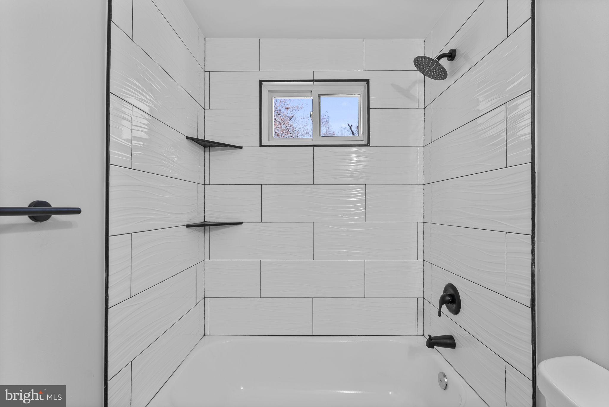 8310 Karl Avenue Rosedale, MD 21237 - Photo 18 of 39 a bathroom with a shower